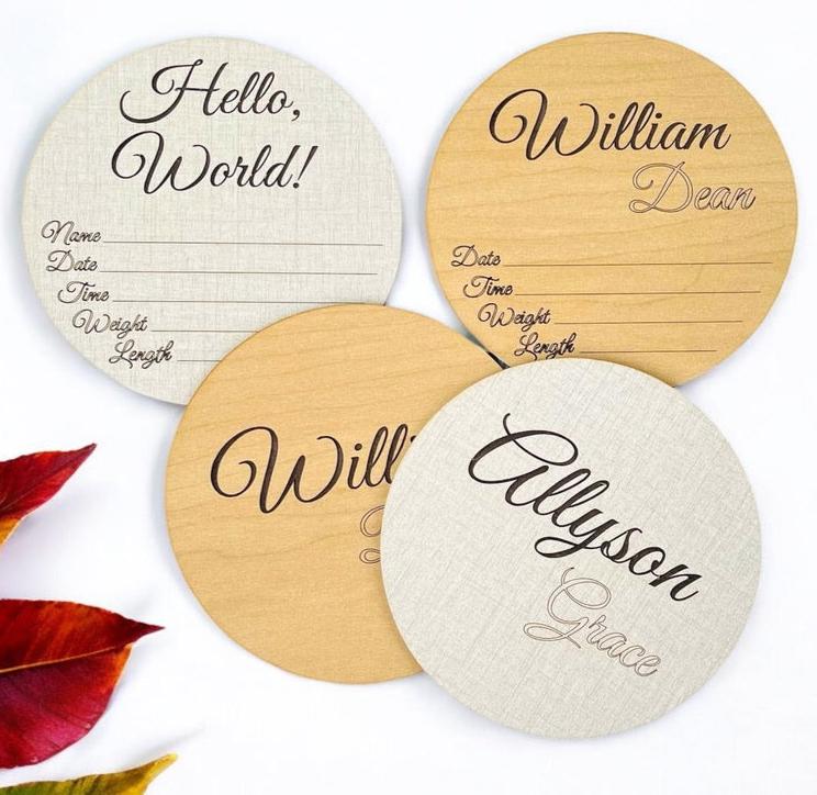 Baby birth stat wooden round birth announcement item. Laser engraved with name and a birth stat area. Beautiful French Script-type cursive writing. Says Hello, World! at the top. You fill in name and birth stats below. Personalized keepsake gift.