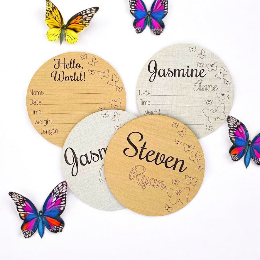 Butterflies adorn this cute baby birth announcement round sign. Five inches round, with a pretty butterfly group engraved on the right side of the item. Hello world at the top, and an area for your to add the newborn name and birth stats.