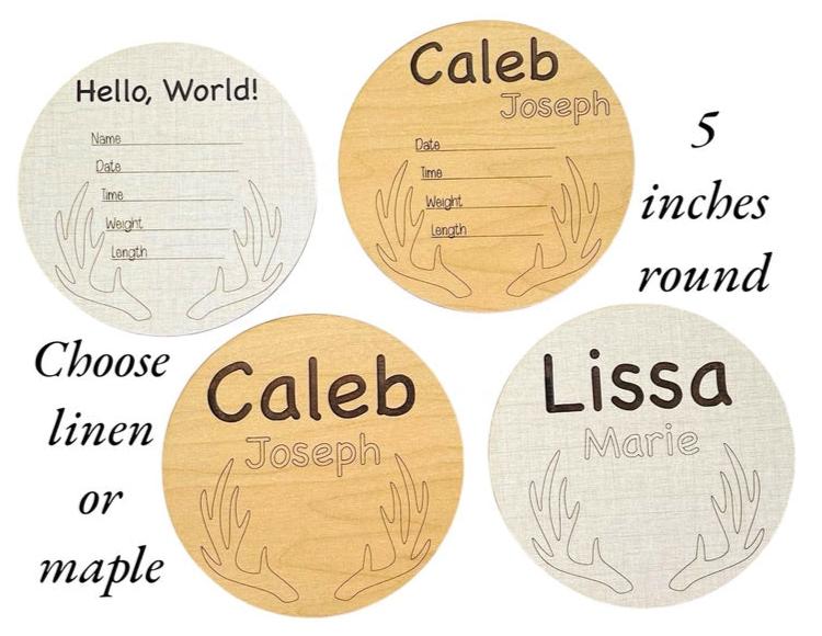 Antlers engraved at the bottom of a round wood baby birth announcement sign. Photo prop for the hospital or nursery. Perfect baby shower gift for the hunting or wildlife fans. From Art by Iceberg, a female-owned small business in Colorado.