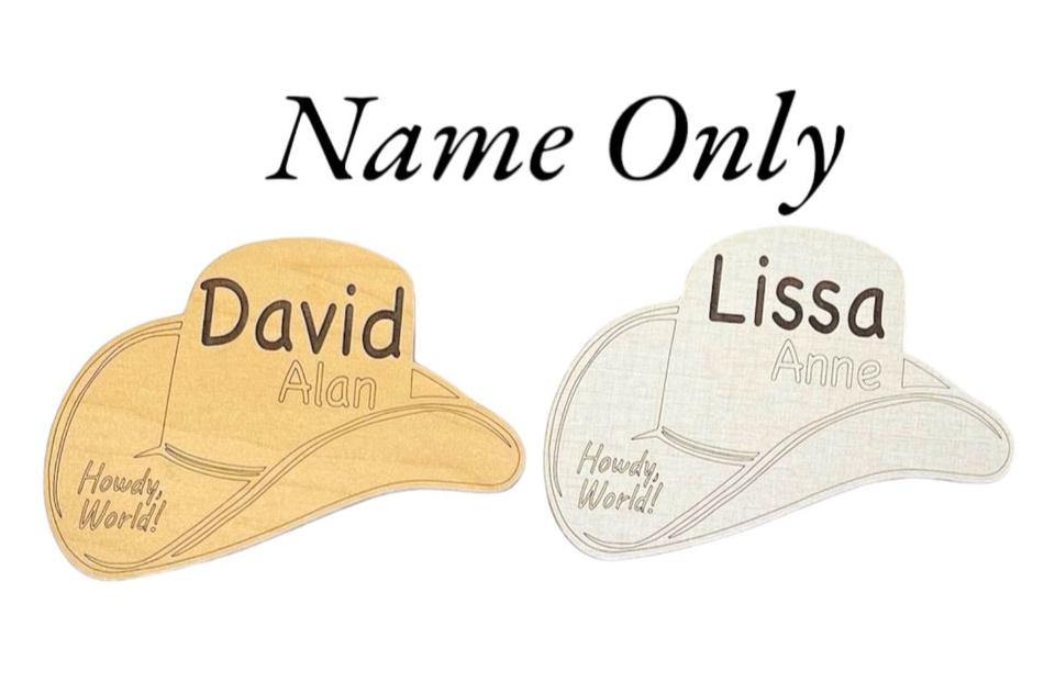 Baby name and stats wooden plaque. By Art by Iceberg. Shaped like a cowboy or cowgirl hat with Howdy World engraved. Fun photo prop or baby shower gift!