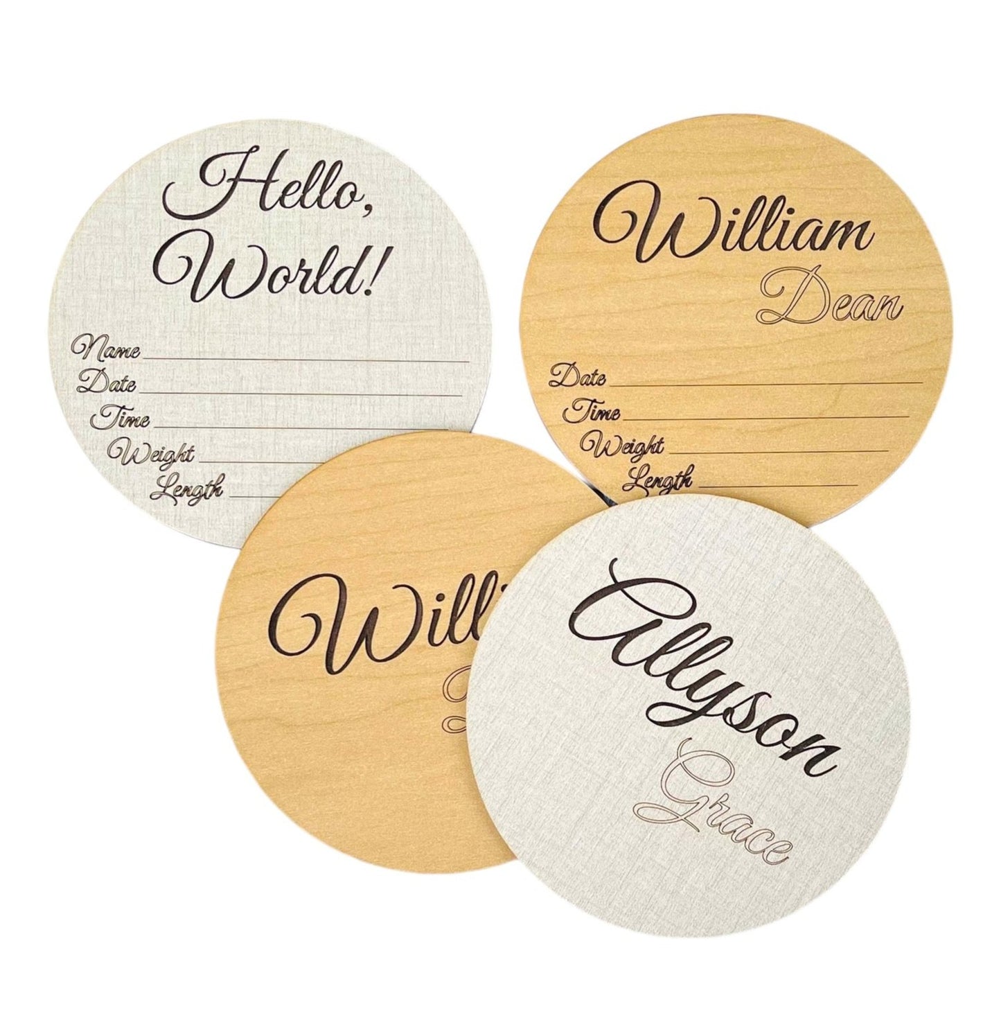 Engraved baby birth announcement round sign. Beautiful French script style writing. Name and birth stat areas. Shown in linen and maple wood color options. Stunning baby shower gift for a hospital or nursery photo prop. From Art by Iceberg.